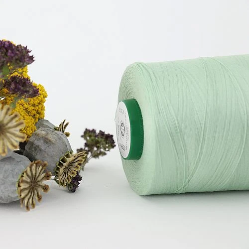 Nähgarn Pistazie 100% Bio Baumwolle Scanfil 5000m Kone 2 Nähgarn Pistazie 100% Bio Baumwolle Scanfil 5000m Kone – Bild 2