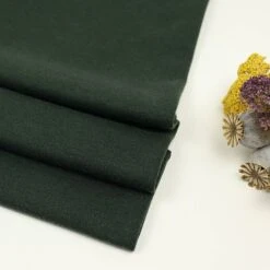 TWO FACE CODA INTERLOCK In Deep Green Von Meet Milk